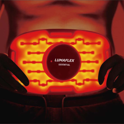 Lumaflex essential device being held against a person's back