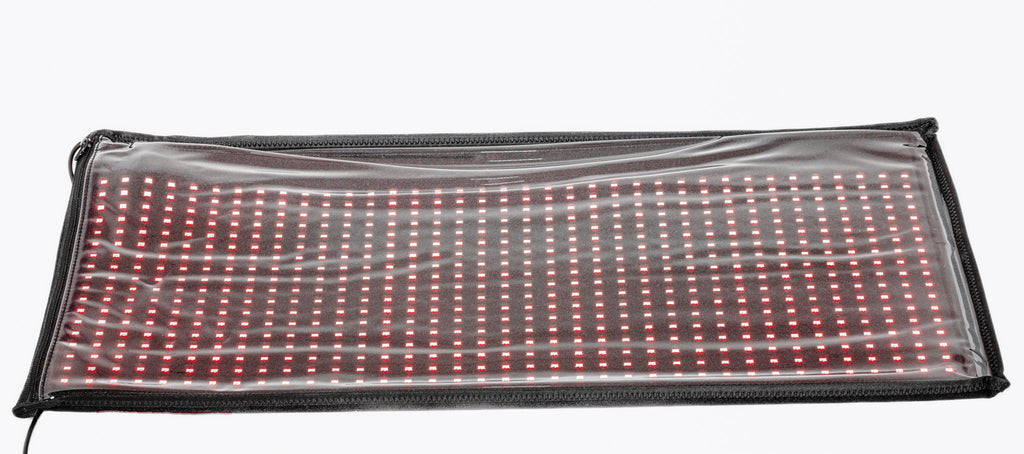 Rectangular LED display panel with red and white lights on a clear background