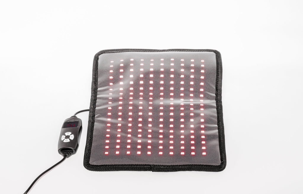 red light teraphy mat  on a white background